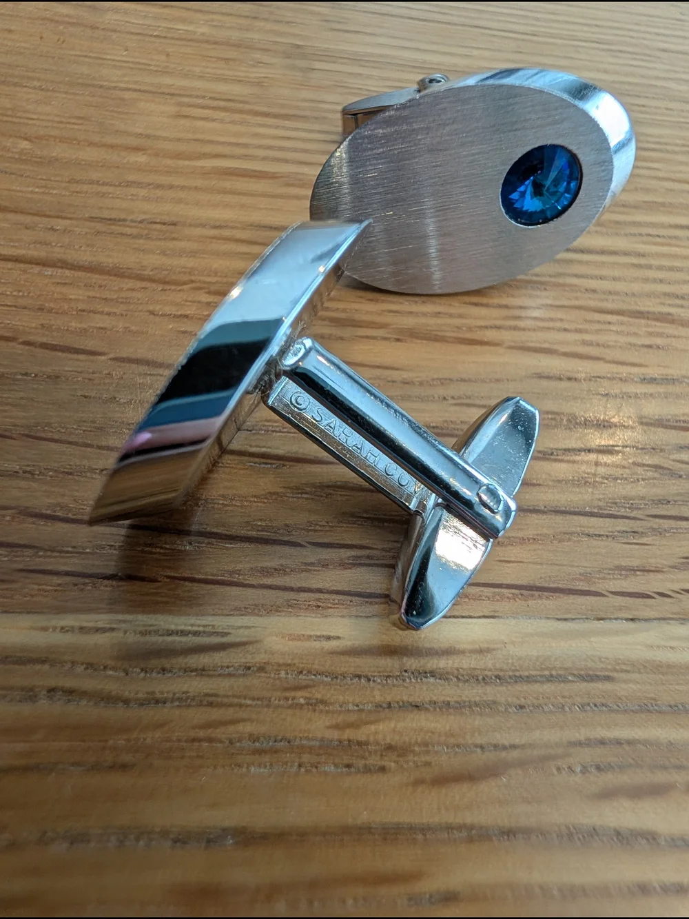 Vintage Brushed Silver Oval Cufflinks with Blue Crystal Accent By Sarah Coventry